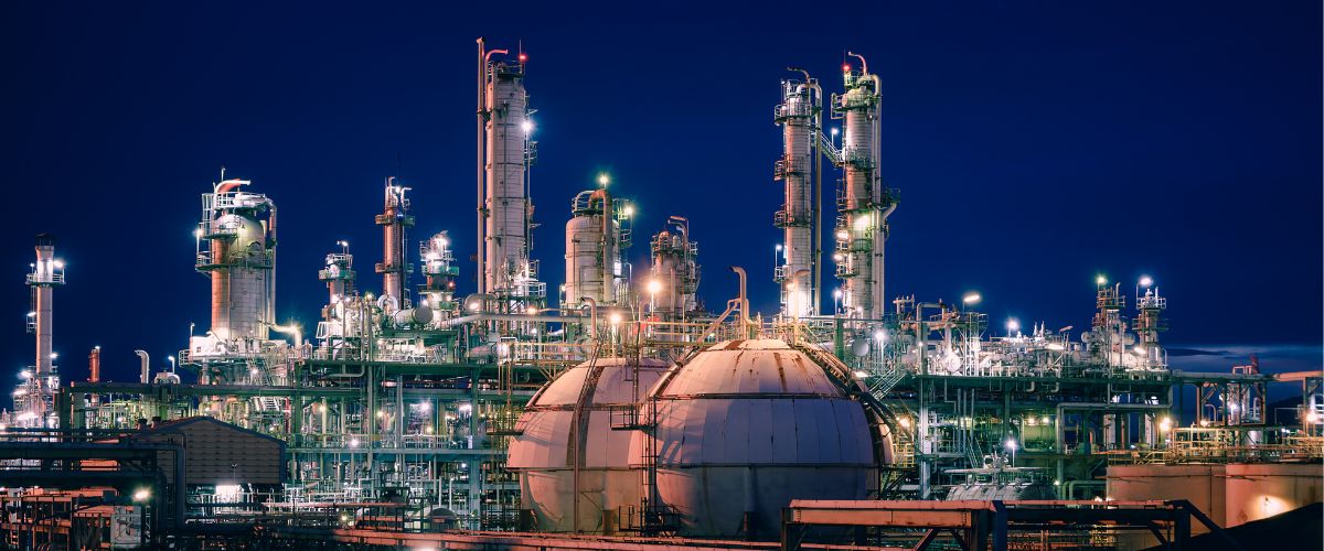 Downstream oil and gas companies - petrochemical plant at night